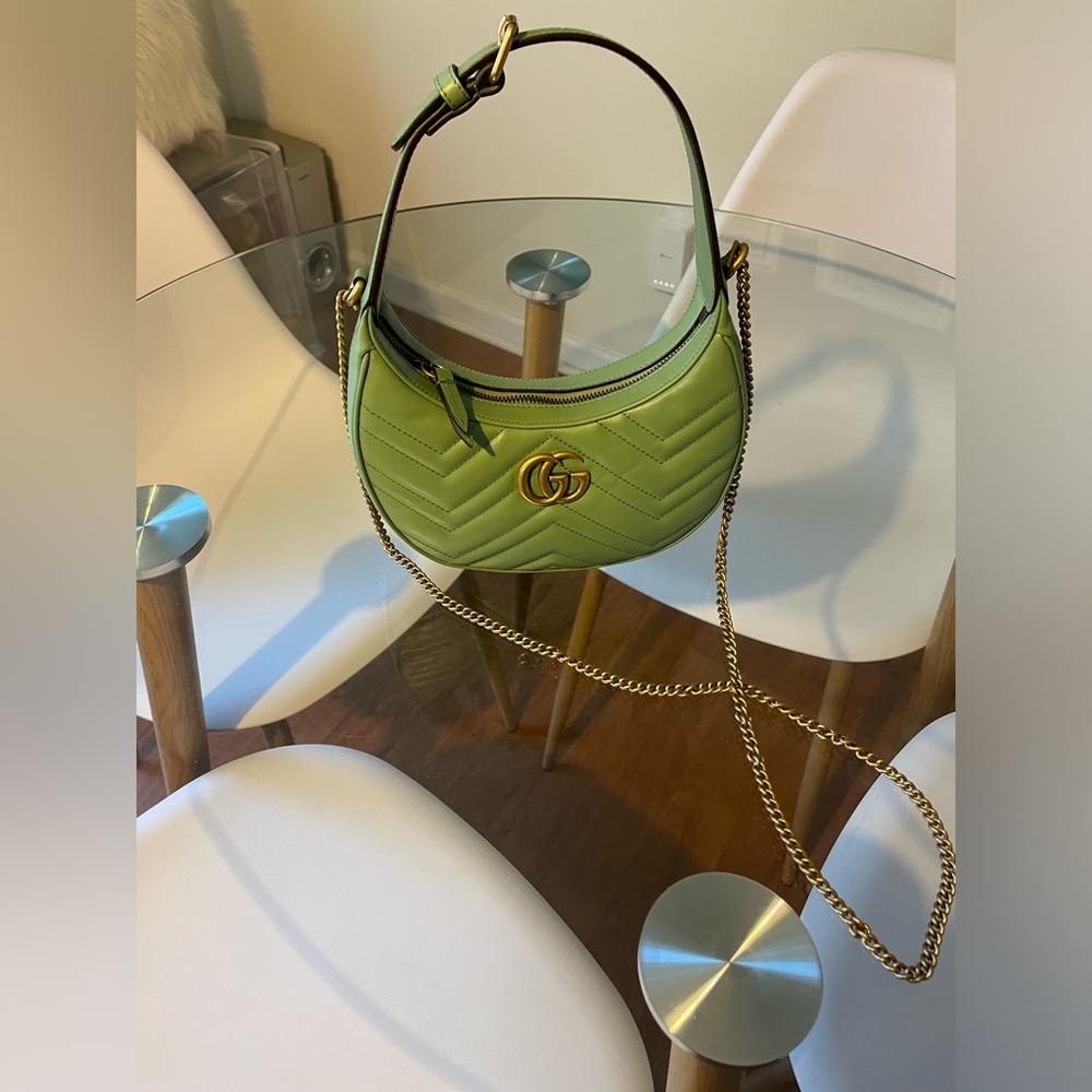 Green and gold Gucci purse